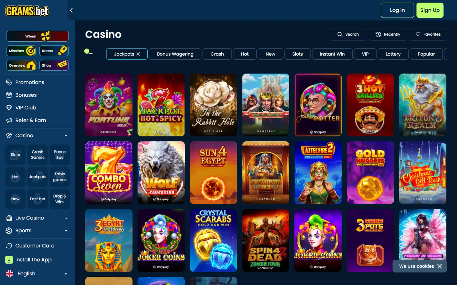 GramsBet Jackpots grid with fruit, Egyptian and fantasy game covers